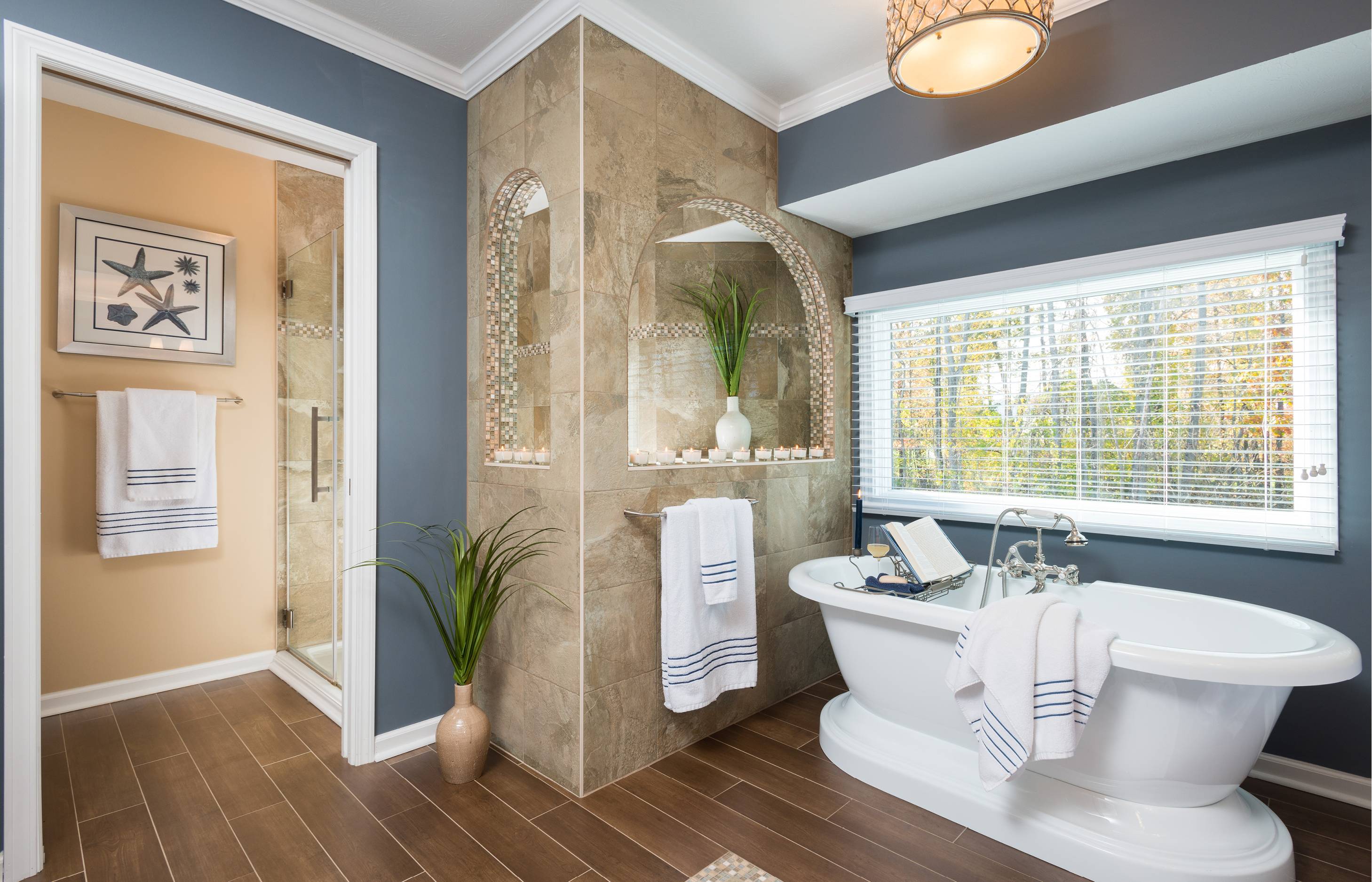 Coastal bathroom design with soaking tub
